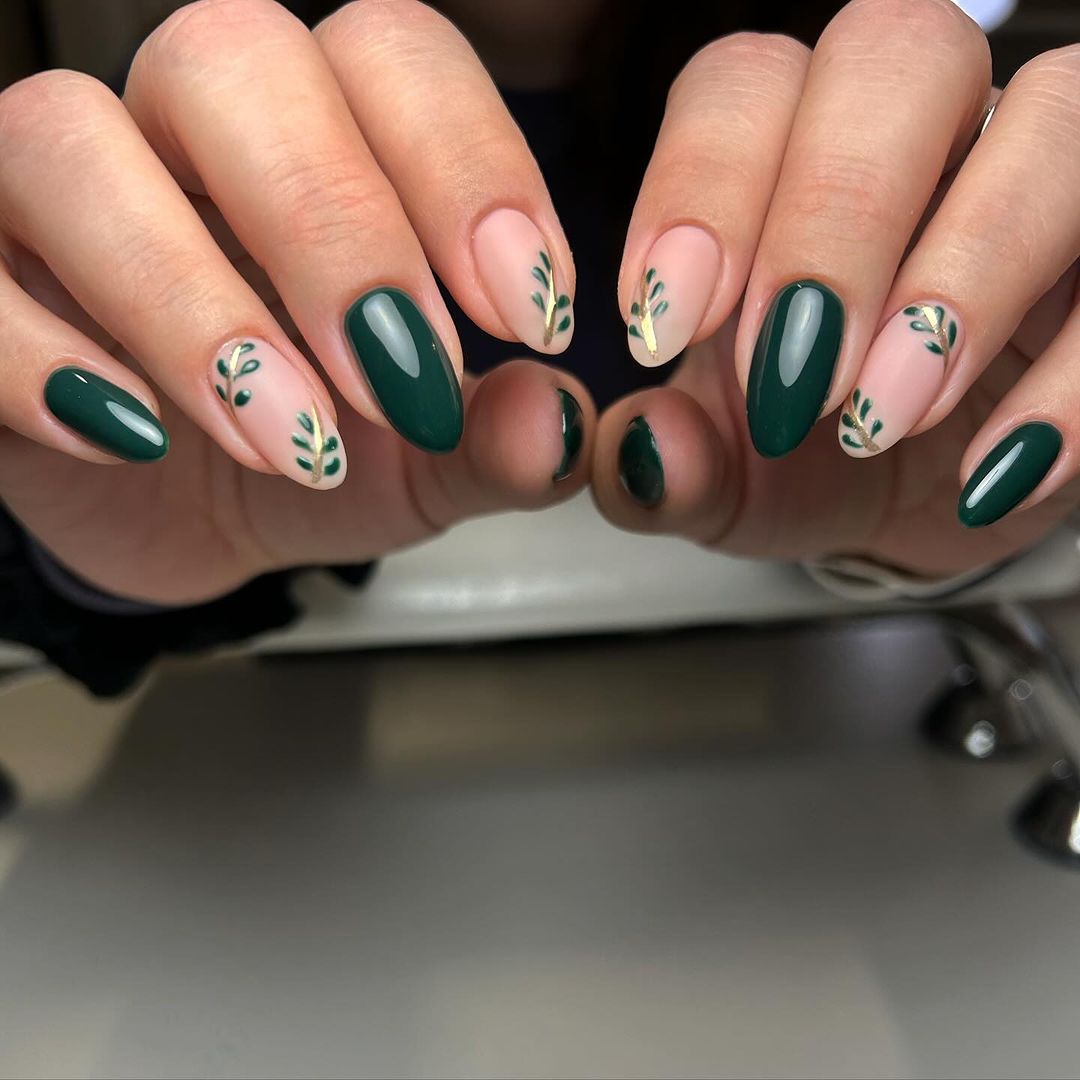 13. Subtle green Christmas nails with pink color