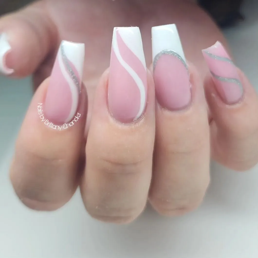 18. Pink and white long tip design