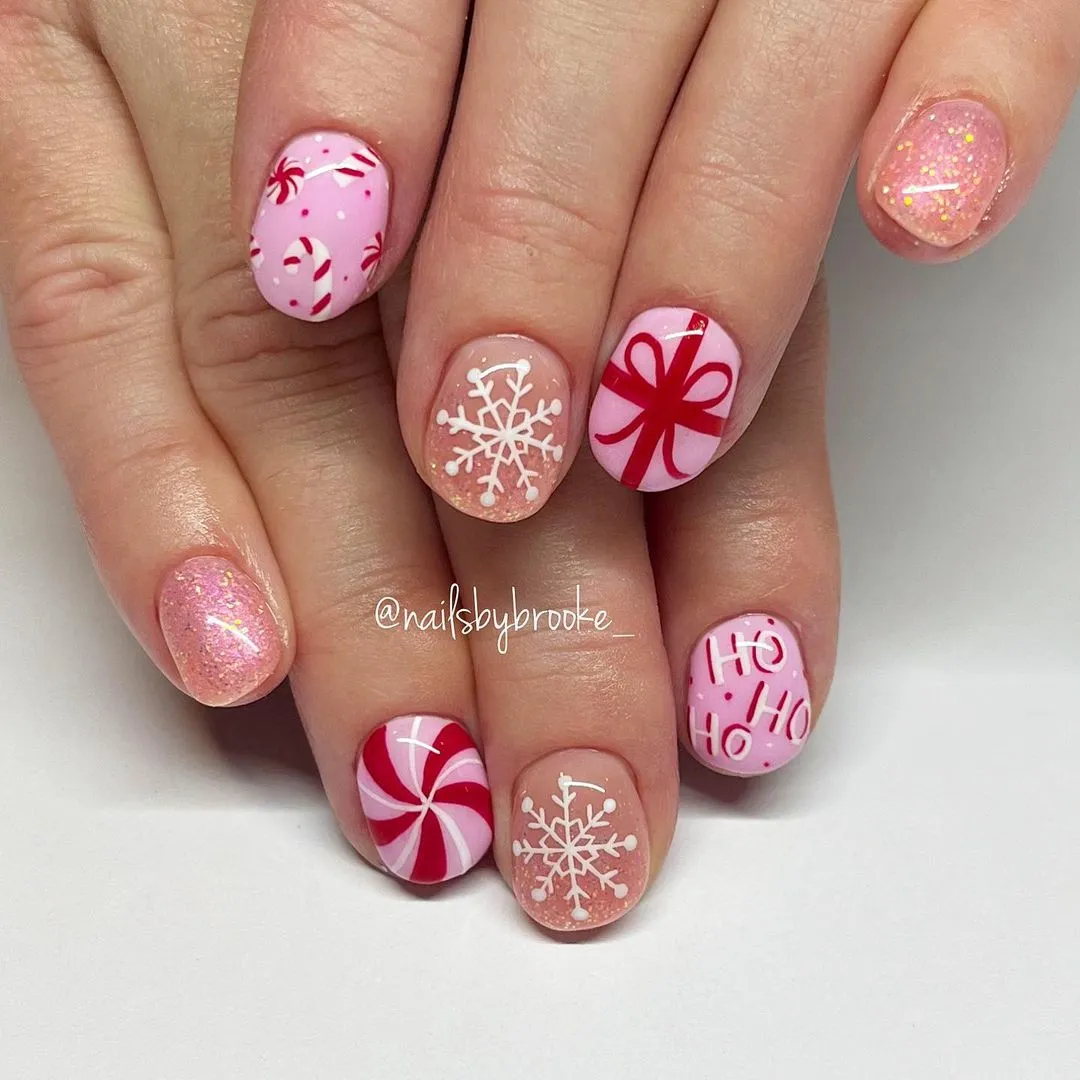 19. Short Pink Christmas nails design