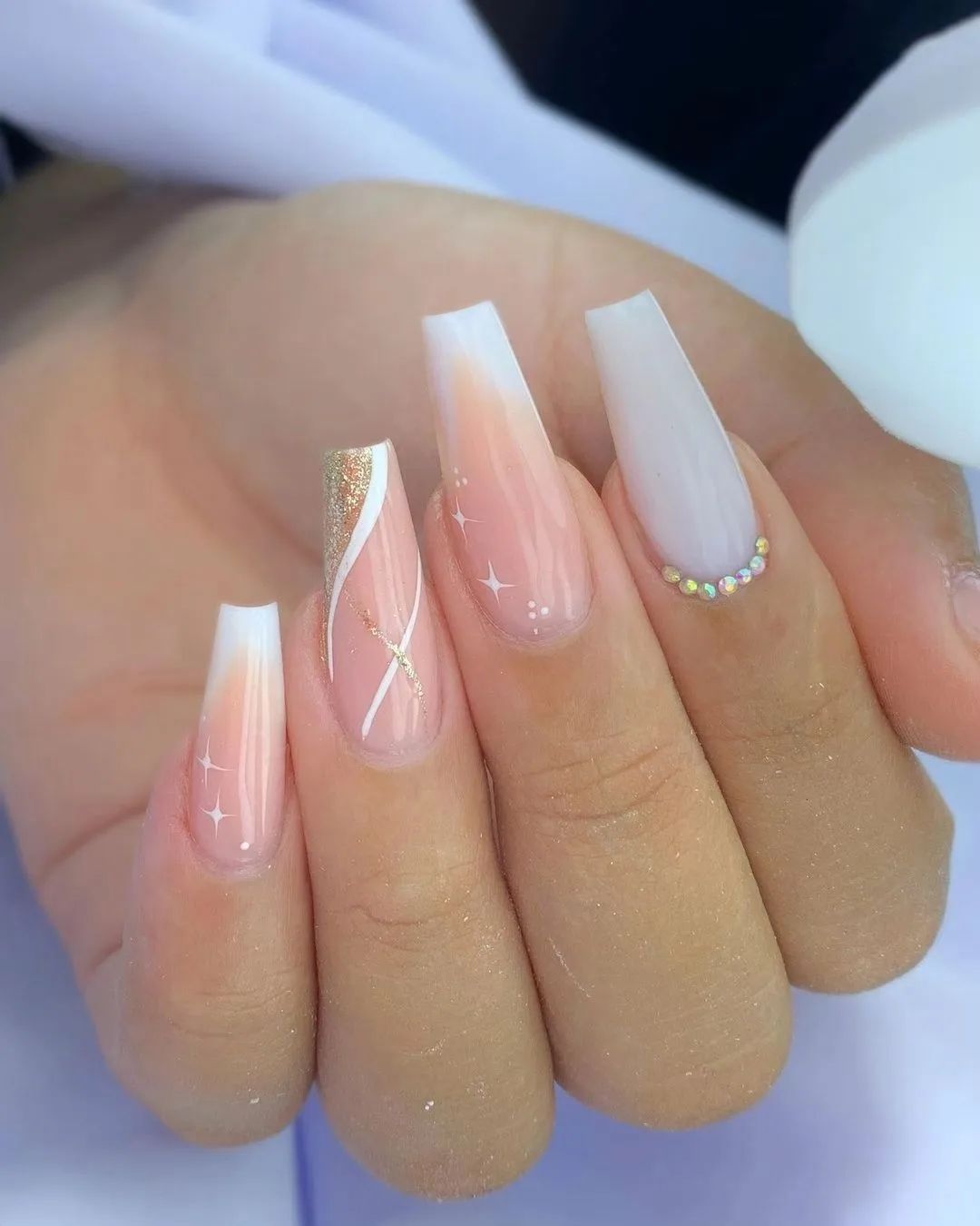 25. Pink nail design with White shade