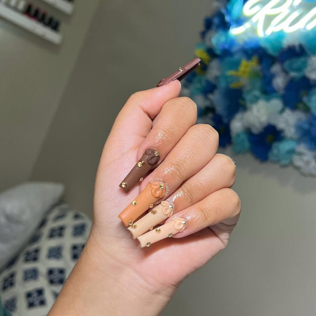 2. Brown Rhinestone Nails